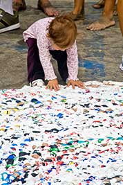 child and carpet at festival